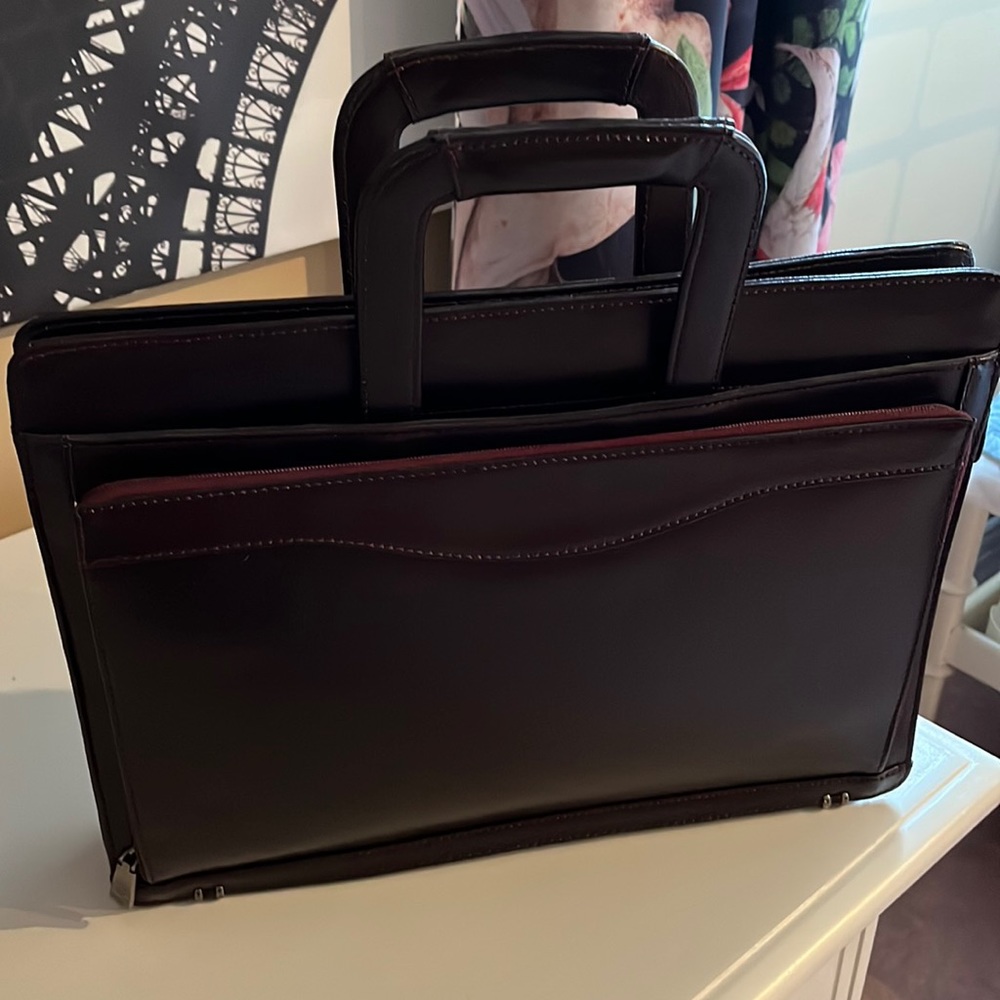 Mancini slim briefcase never used.